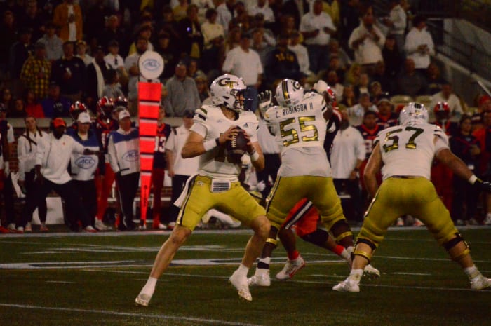 Haynes King passing the ball against Syracuse